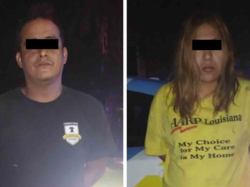 Pareja detenida por agredirse por una visa. Foto: Cortesía