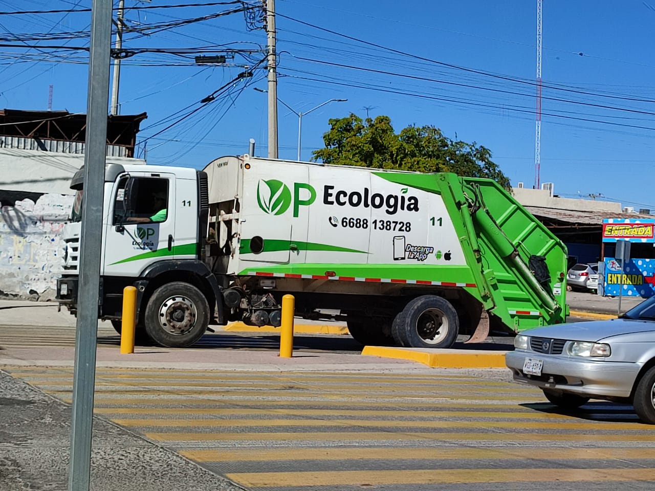 Camiones de OP Ecología (Los Noticieristas)